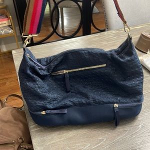 Stella &Dot travel bag. Navy crocodile embossed tote with backpack straps.